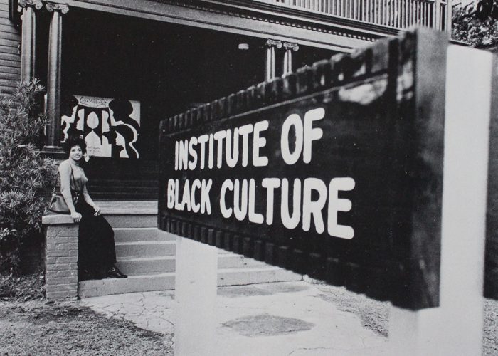 A woman outside of the Institute of Black Culture